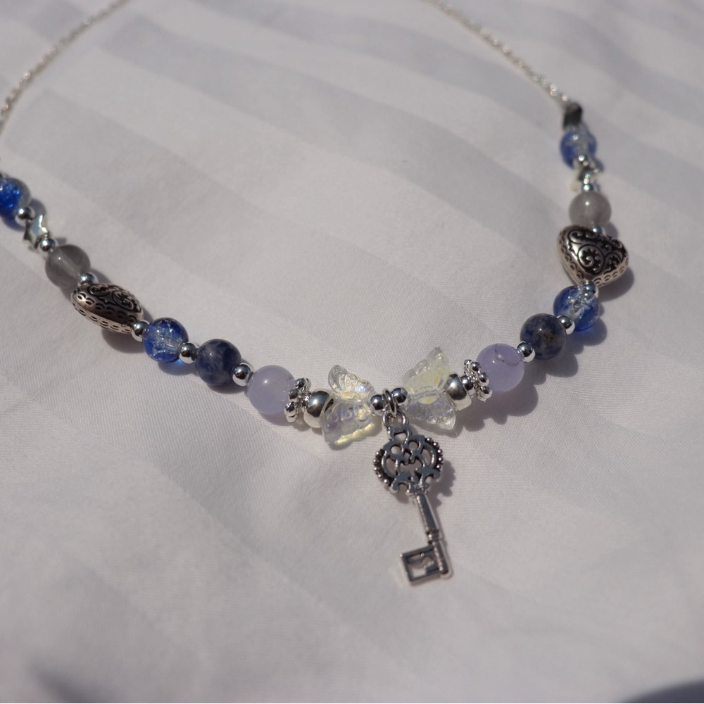 Elegant Beaded Necklace with Heart Charms